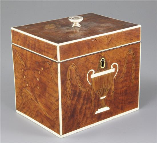 A Regency satinwood, marquetry and ivory inlaid tea caddy, width 5in.